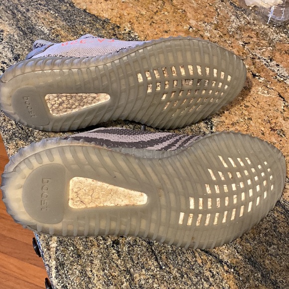 Gently used. Excellent shape Grey Beluga Yeezys.